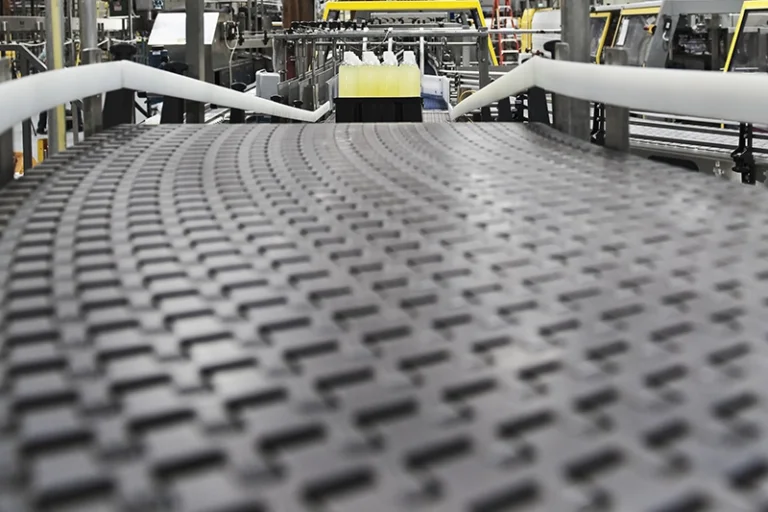 close-up-of-conveyor-belt-in-bottling-plant-2025 closeup of conveyor belt